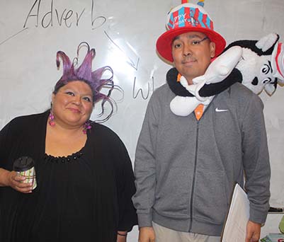 Two staff members dressed up for Dr. Seuss Day